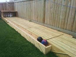 How To Build Your Own Backyard Bowling Alley Kid Friendly Backyard Playground Backyard Diy Diy Backyard