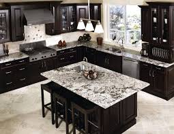 By bringing the backsplash from the countertops to the ceiling, the designer created a sizable accent wall that appears as if it was carved right out of the earth. 43 Images Of Astounding Kitchen Backsplash Ideas Dark Cabinets Hausratversicherungkosten