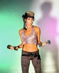hit me baby one more time these might be the best crop tops looks ever cher photos cher 90s fitness trends