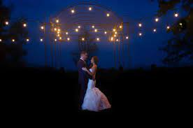 Dancing Under The Arbor At Stepping Stones Garden Skagit Valley Weddings Wed In Skagit Outdoor Wedding Lighting Outdoor Wedding Reception Wedding Lights