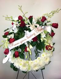 You lived a life just as colorful as these flowers. White Red Standing Spray With Ribbon Funeral Flowers Http Www Flowersbeautiful Com Sy Funeral Flowers Funeral Flower Arrangements Funeral Flower Messages