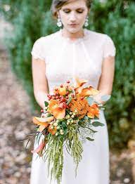 I love the colour green for a fresh classic wedding palette, and i also love a modern wedding palette with bright pops of orange. Wedding Bouquets Orange And Green Bridal Bouquet Photo By Casey Rose Photography Ruffledblog Co Wedding Lande Leading Wedding Magazine Ideas Inspir Bridal Bouquet Flower Bouquet Wedding Boho Wedding Bouquet