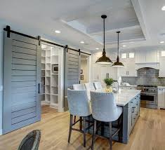 Custom Sliding Doors Island Are Painted In Sherwin Williams Sw0077 Classic French Gray I Farmhouse Kitchen Design Wood Doors Interior French Doors Interior