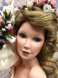 Shelby Rose" is the first issue in the Magnolias and Lace collection of  handcrafted porcelain collector's dolls Designed by artist Sandra Bilotto  in an exclusive edition for The Ashton-Drake Galleries.Approx. high 48cm