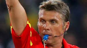 Dommer med kors i fløjten