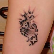 It symbolizes faith, love and hope. Heart Cross Image Meaning Discovering The Inspiration Behind This Picture Design Body Tattoo Art