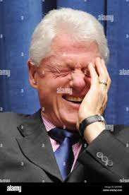Bill clinton laughing hi-res stock photography and images