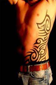 Ancient masters of tattoo art prayed for a long time before each inking of the body. Ribtattoos Co Domain Expired Tribal Tattoos Rib Tattoos For Guys Cool Tribal Tattoos