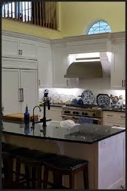White Flat Panel Painted Kitchen Cabinets With Flush Inset Doors And Drawers Custom Kitchens Kitchen Cabinets Kitchen