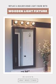 The amount of cotton cording. Wooden Light Fixture Over Bathroom Mirrors Gray House Studio