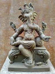 A statue of ganesha, one of the hindu gods, carved in the style of javanese art. Morti Of Lord Of Ganesh Ganesh Art Lord Shiva Painting Shri Ganesh Images