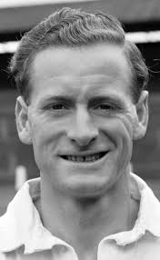 My father Dickie Robinson (Middlesbrough) and Dennis Compton (Arsenal) at  Highbury, in an arial duel, I think probably between 1946-1949. Not too  sure of the date?