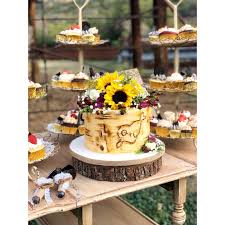 Birch Tree Wedding Cake With Sunflowers Love The Rustic Look Of This Birch Tree Tier Topped With Fresh Sunflowers And Other Floral Decor The Assorted Cup In 2020 Birch Tree Cakes Tree Cakes Wedding Cupcakes