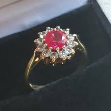 It has been set with a lovely oval cut rubyone of the most valuable gemstones on earth. Antiques Atlas Vintage 1ct Ruby Diamond Halo Gold Ring O