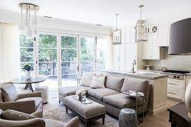 We would love a wide island facing the cooktop area rather than a long one. Kitchen Family Room With Gray Sectional Transitional Living Room