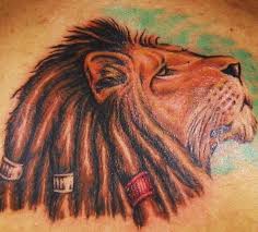 Lion, the king of beasts is one… Lion Of Zion With Dreads Coloured Tattoo Tattooimages Biz