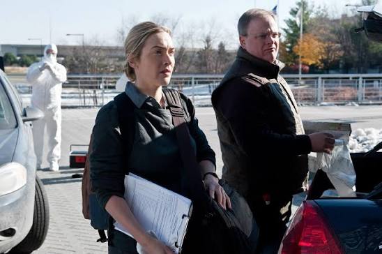 Contagion - (L-r) KATE WINSLET as Dr. Erin Mears and LARRY CLARK as Dave in the thriller “CONTAGION,” a Warner Bros. Pictures release. ©2011 Warner Bros. Entertainment Inc.
