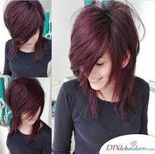 Big hair, long emo bangs in different colors, and large flower clip. Pin On Frisuren Mittellanges Haar