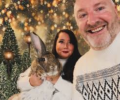 Family Thanksgiving photo re-enacting favorite episode