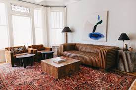 This Atlanta Loft S Style Is Everything But The Kitchen Sink Living Room Lounge Home Home Decor