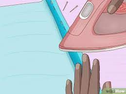Next, you will need to secure the hem fabric under the dress using pins. How To Shorten A Dress 10 Steps With Pictures Wikihow