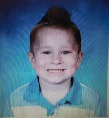 First grade photo of the "overalls" kid at Waikiki School