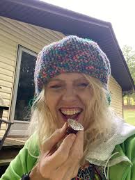 Introduction and sharing a photo of a softball playing granddaughter