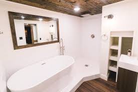 Contrast these surfaces with black or white fixtures. 10 Foot Wide Tiny Home With An Amazing Bathroom