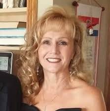 Hello! Struggling which what to put in this space marked with an X. It has  an art light above it. Narrow space going down the stairs. Appreciate the  suggestions!