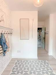 Modern Farmhouse Mudroom Ideas Hallstrom Home Place hooks and hanger to store your coats. hallstrom home