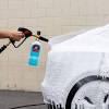 Car wash wand with soap dispenser. 1