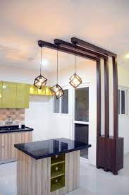 This keeps the soiled utensils and kitchen mess out of view. Add Pretty Pendant Lights To Your Kitchen With An Island Modern Open Small Living Room Partition Design Kitchen Interior Design Decor Room Partition Designs