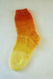 We photographed them, unblocked, which is something. Using Gradients Socks Knitcircus