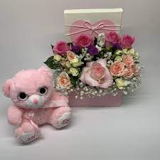 Beautifully arranged to delight and surprise anyone on their special day. Pink Romance Box With Teddy Bear In Uae Gift Flower Flower Arrangement Roses Flowers Flower Delivery Dubai