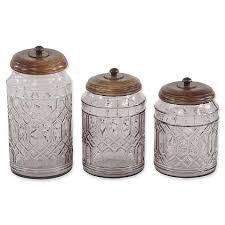 Take out the necessary tools to cook, wash them, dry them and store them again. Ridge Road Decor Round Glass Canisters With Lids Set Of 3 Bed Bath Beyond In 2021 Glass Canisters Clear Glass Canisters Kitchen Canister Set