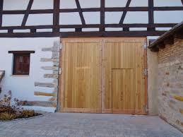 Wenn sie ein weinregal selber bauen möchten, stehen ihnen ganz unterschiedliche möglichkeiten zur verfügung. Flugeltore Aus Holz Allemann Gmbh Holz U Metallprodukte