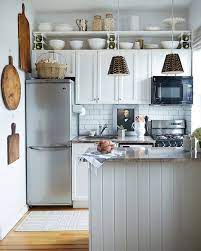 Another Way To Use That Above Cabinet Space Hang A Shelf There Tiny Kitchen Design Small Kitchen Decor Decorating Above Kitchen Cabinets