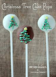 Firmly insert a wooden ice pop stick into the short side of each cheesecake slice, about 2 1/2 inches deep. Christmas Tree Cake Pops
