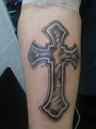 The symbol of the cross is timeless and dates all the way back to the 5th century. Forearm Cross Tattoo Designs