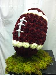 Football Arrangement Funeral Flowers Funeralflowers Sympathy Theflowershopfairoaks Funeral Floral Funeral Flowers Unique Flower Arrangements
