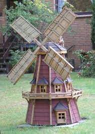 Adding A Garden Windmill Can Make More Decorative Impact To Your Garden Decorifusta Garden Windmill Plans Windmill House Garden Windmill