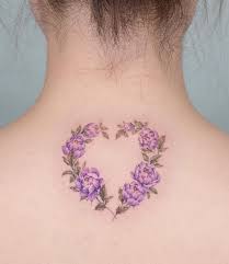 Heart with flowers coming out tattoo. The Ultimate Guide To Flower Tattoos