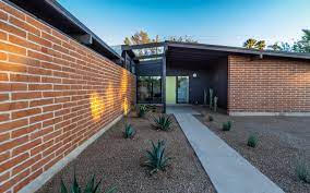 Leaving adobe brick exposed, or covering it in a natural plaster, either way it feels soft and subtle in its elegance and grace. All About Burnt Adobe Homes In Tucson Realtucson Com