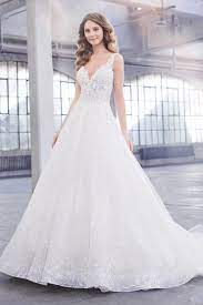 A beautifully beaded bodice with a gorgeous ball gown silhouette and side pockets on this romantic bridal gown. Martin Thornburg Fall 2019 Bridal Dresses Martin Thornburg Wedding Dresses Mon Cheri