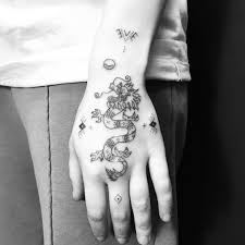 Rose with dragon tattoo designs | dragon rose tattoos. Hand Poked Dragon Tattoo By Nadia Rose Tattoogrid Net
