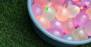 Swimming pool filled with water balloons. 11 Water Balloon Games For Kids A Splashing Good Time Guaranteed