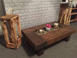Solid wood, natural oil, wax, solid board oak, oak shell board. Bespoke Hand Crafted Railway Sleeper Coffee Table With Center Feature Available In 15 Different Sizes Buy Online In Antigua And Barbuda At Antigua Desertcart Com Productid 202787343
