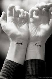 This is a very creative design, especially for women. 95 Lovely Wording Tattoos On Wrist