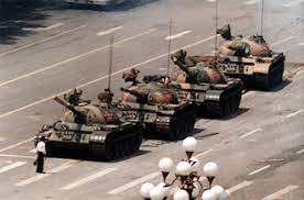 'tank man' (aka the 'unknown rebel') stood in front of a column of tanks leaving tiananmen square on. Tank Man Wikipedia