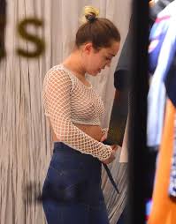 Braless Miley Cyrus flashes her nipples in completely see-through ...